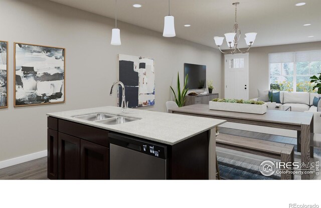 410 High Point Dr Unit 104, Longmont, CO 80504 - kitchen with pendant lighting, sink, dishwasher, a center island with sink, and a chandelier