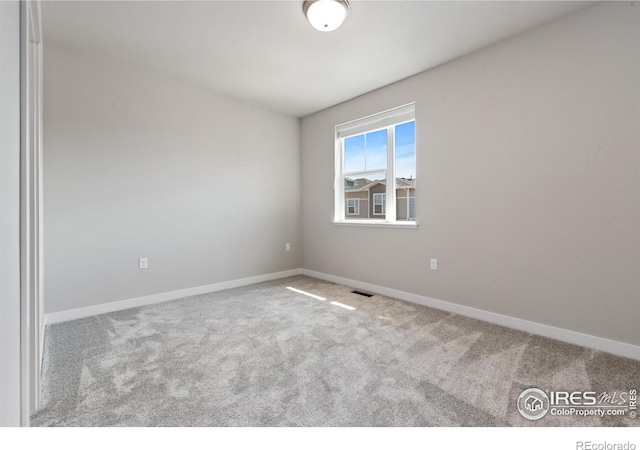 410 High Point Dr Unit 104, Longmont, CO 80504 - view of carpeted empty room