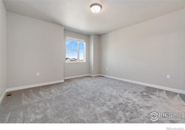 410 High Point Dr Unit 104, Longmont, CO 80504 - view of carpeted empty room