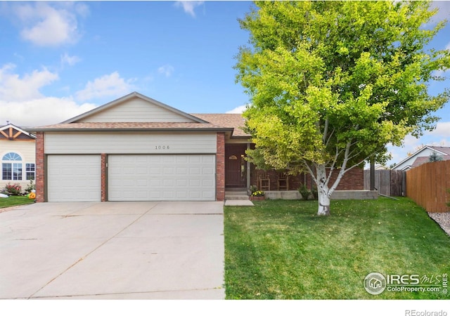 single story home featuring a front lawn and a garage