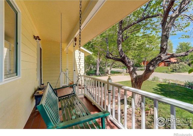 balcony featuring a porch