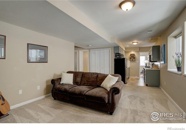 living room with light carpet