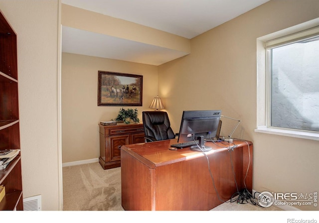 office area with light colored carpet