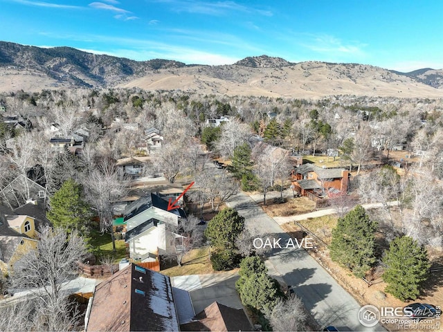 birds eye view of property featuring a mountain view