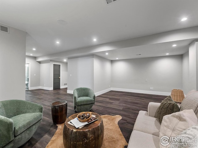 living room featuring dark hardwood / wood-style flooring