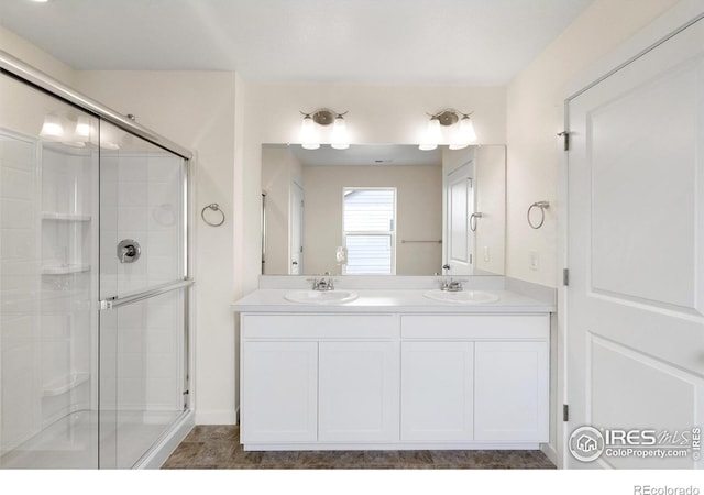 bathroom with vanity and walk in shower