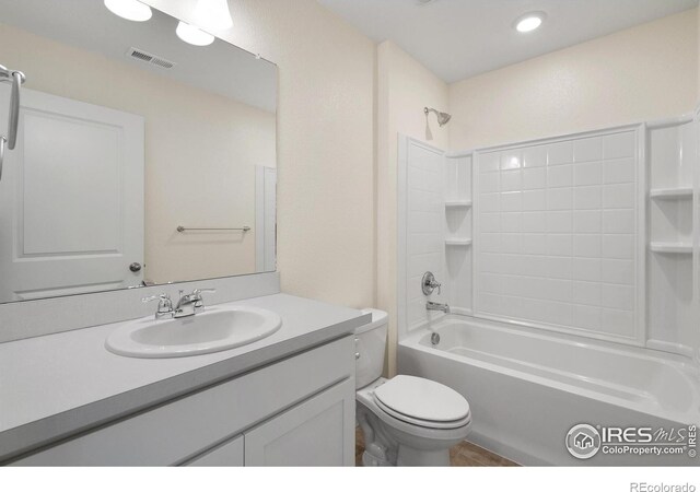 full bathroom with vanity, toilet, and tub / shower combination