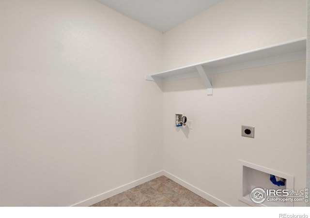 clothes washing area with electric dryer hookup, gas dryer hookup, and hookup for a washing machine