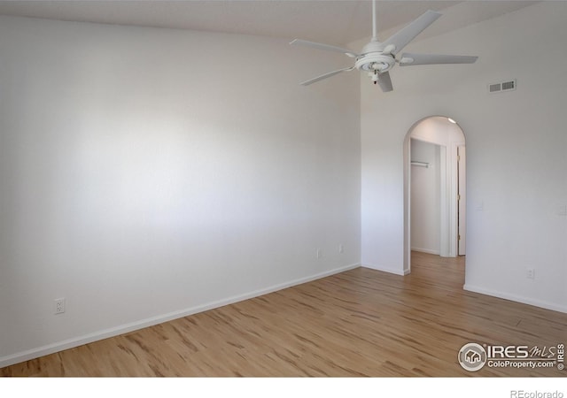 spare room with ceiling fan and light hardwood / wood-style floors