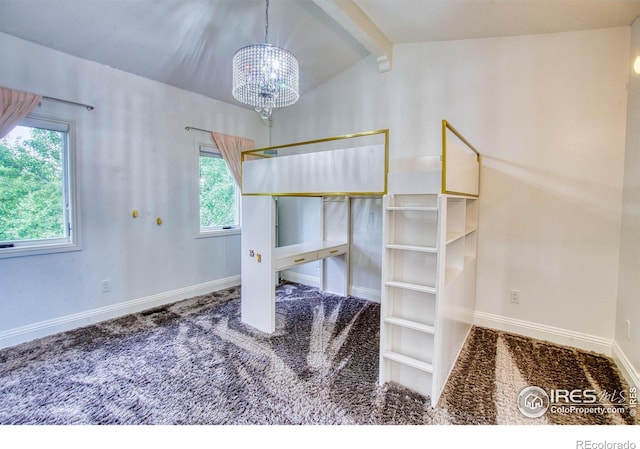 carpeted bedroom featuring vaulted ceiling with beams and a chandelier