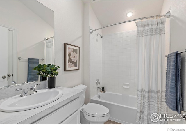 full bathroom featuring vanity, toilet, and shower / tub combo with curtain