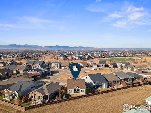 bird's eye view with a mountain view