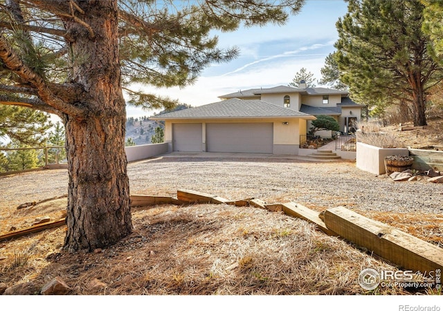 view of front of property with a garage