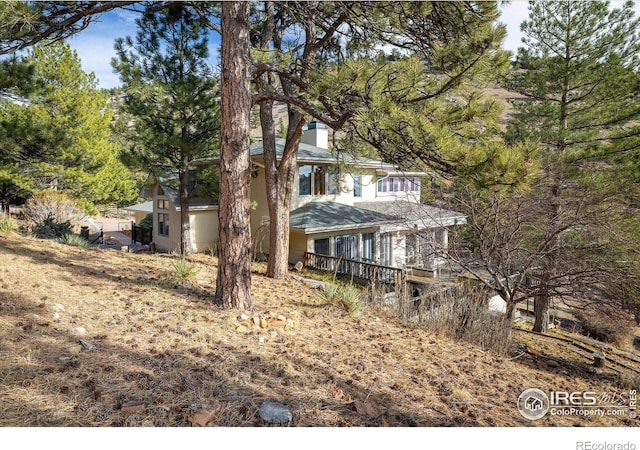 view of front of house with a wooden deck