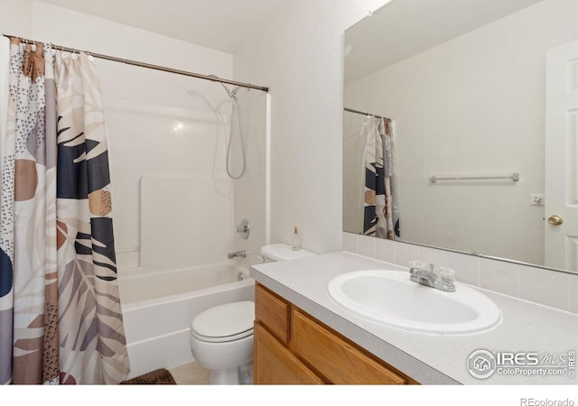 full bathroom with vanity, toilet, and shower / bathtub combination with curtain