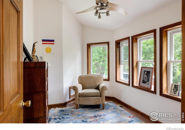 sitting room featuring ceiling fan, lofted ceiling, and hardwood / wood-style flooring