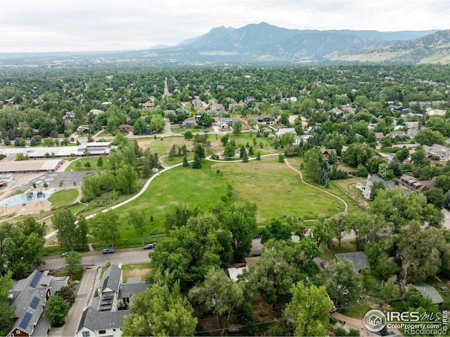 birds eye view of property featuring a mountain view