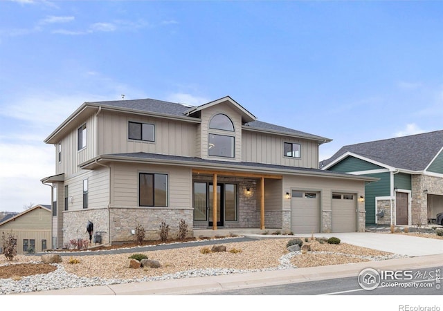 view of front of property featuring a garage