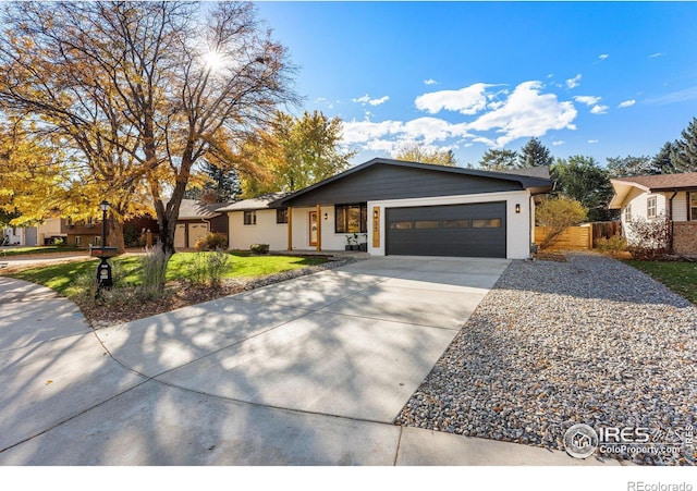 ranch-style house featuring a garage