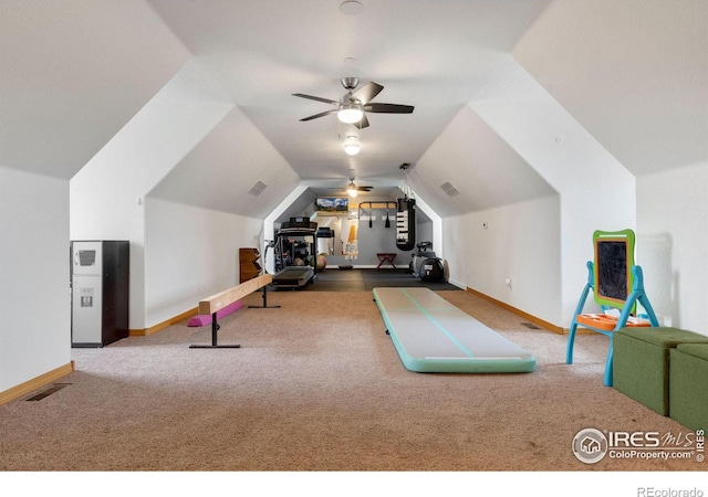 exercise room with carpet floors, ceiling fan, and lofted ceiling