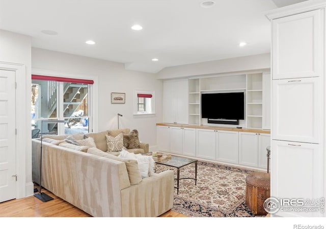 living room with light hardwood / wood-style floors