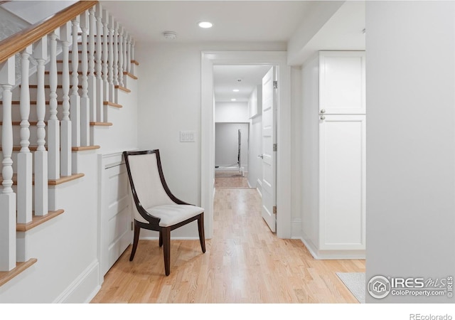 hall with light wood-type flooring