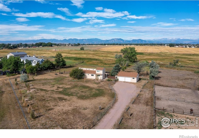 bird's eye view featuring a mountain view and a rural view