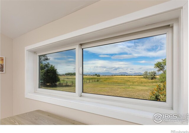 interior details featuring a mountain view and a rural view