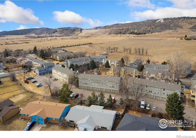 bird's eye view featuring a mountain view and a residential view