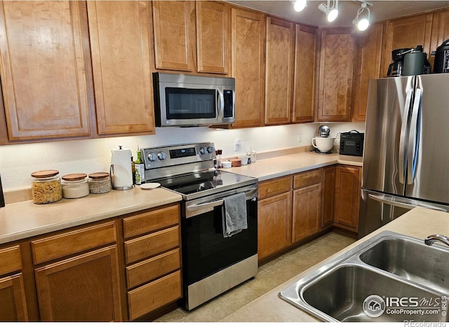 kitchen featuring sink and stainless steel appliances