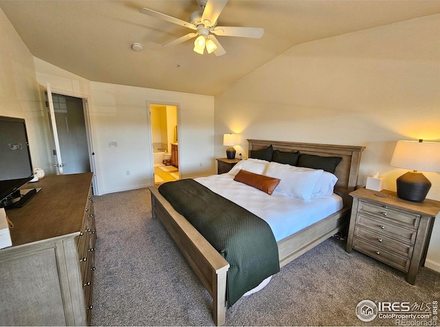 carpeted bedroom with vaulted ceiling, ensuite bath, and ceiling fan