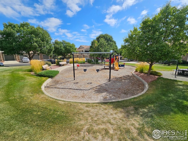 view of play area featuring a lawn