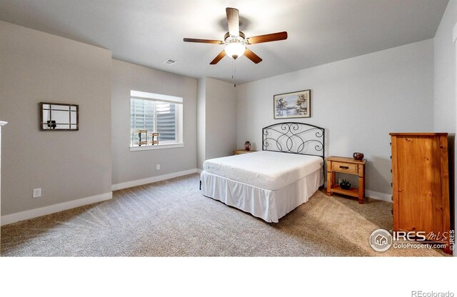 bedroom with light colored carpet and ceiling fan