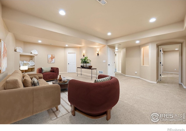 living room featuring light colored carpet