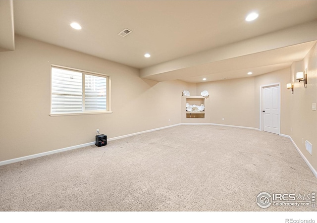 spare room featuring carpet floors