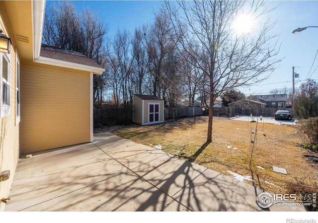 exterior space with a patio area and a storage unit