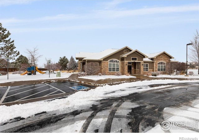 view of front of home with a playground