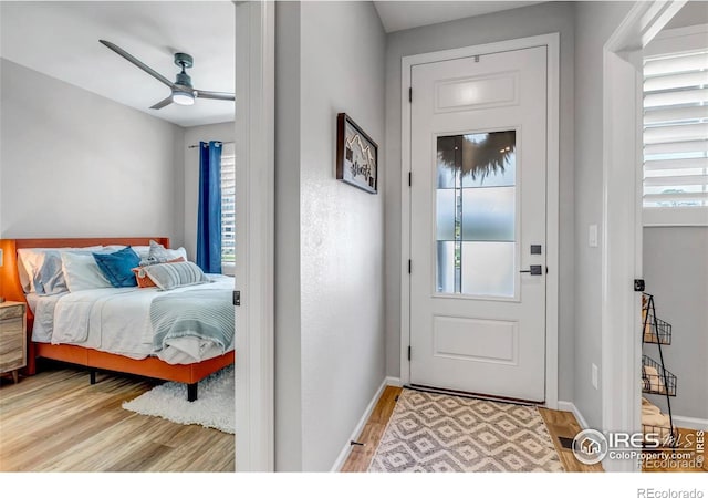 bedroom featuring light hardwood / wood-style flooring and ceiling fan