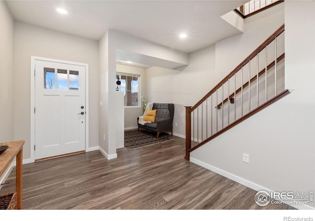 entrance foyer featuring dark wood-type flooring