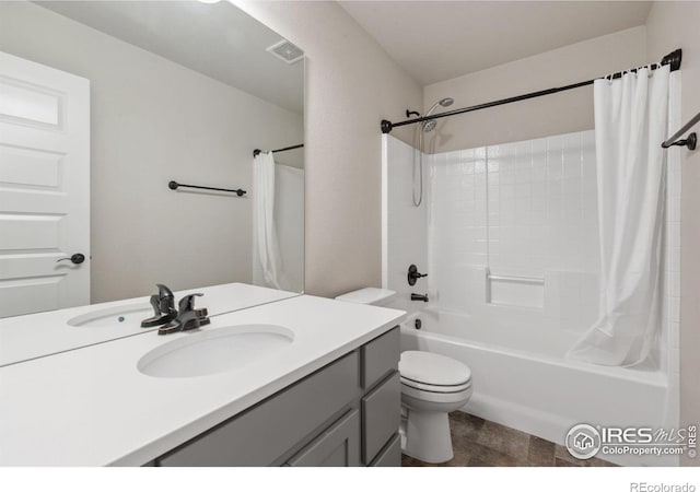 full bathroom featuring vanity, toilet, and shower / bathtub combination with curtain