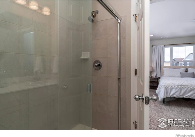 bathroom with an enclosed shower