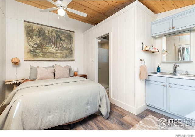 bedroom featuring sink, light hardwood / wood-style flooring, ceiling fan, and wood ceiling