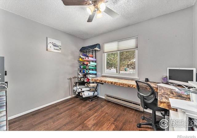 office area featuring a textured ceiling, dark hardwood / wood-style floors, ceiling fan, and baseboard heating