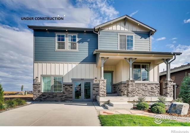 craftsman-style home featuring french doors