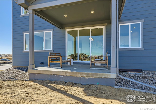 property entrance with covered porch