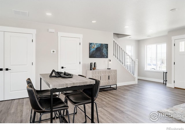 dining area with light wood-type flooring