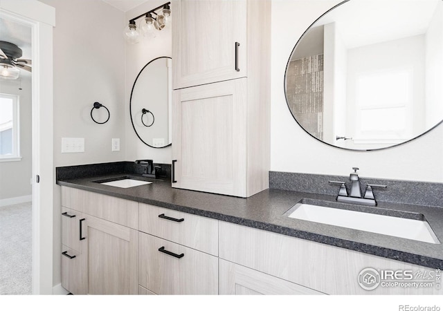 bathroom with vanity and ceiling fan