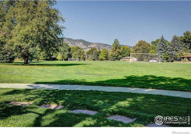 surrounding community featuring a mountain view