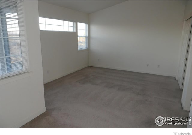 view of carpeted spare room