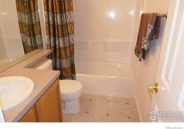 full bathroom with tile patterned flooring, vanity, shower / tub combo, and toilet